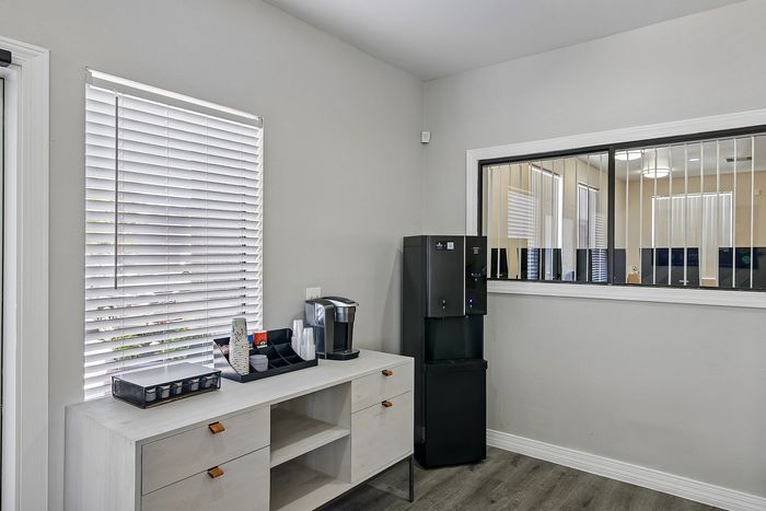 community room at ventura villas with a coffee station
