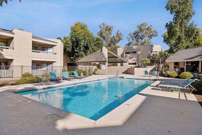 Pool at Silver Creek with lounge chairs