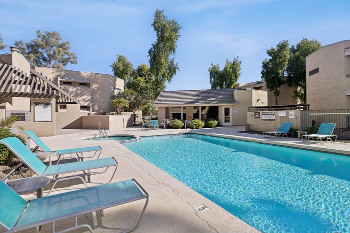 Pool at Silver Creek with lounge chairs