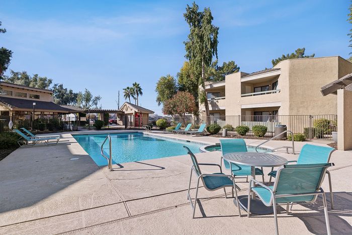Pool at Silver Creek with lounge chairs