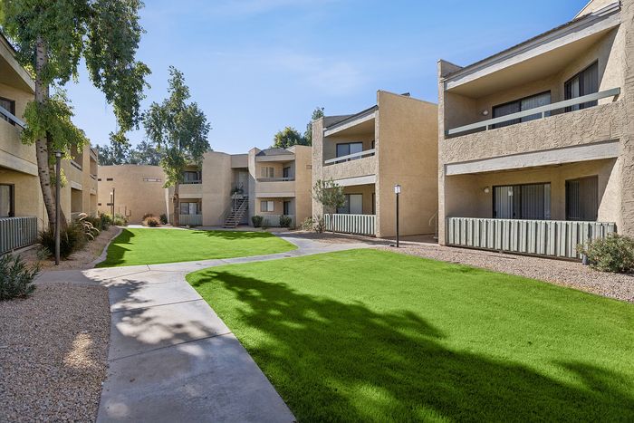 Grassy area outside in the community sidewalk