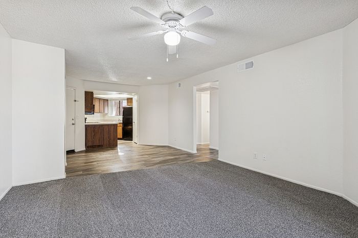 Living Room at Silver Creek with view into the dining and kitchen area
