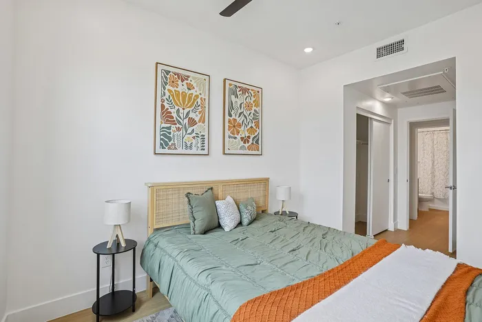 bedroom of one bedroom apartment at asa midtown apartments