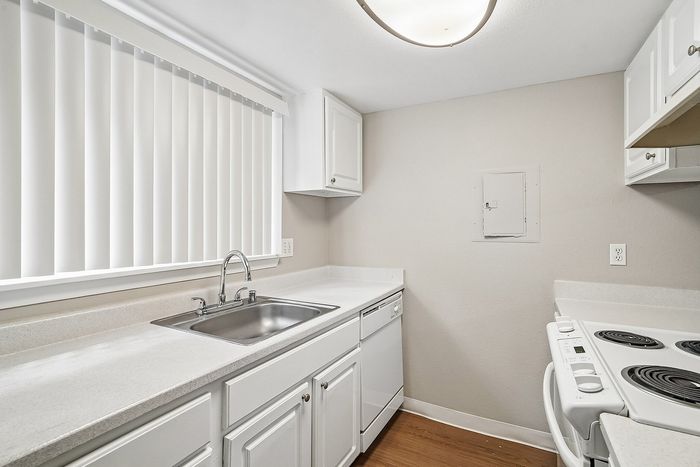 Kitchen at Creekwood with a window over the sink