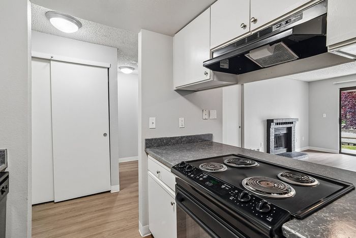 Kitchen at Creekwood with view into living room