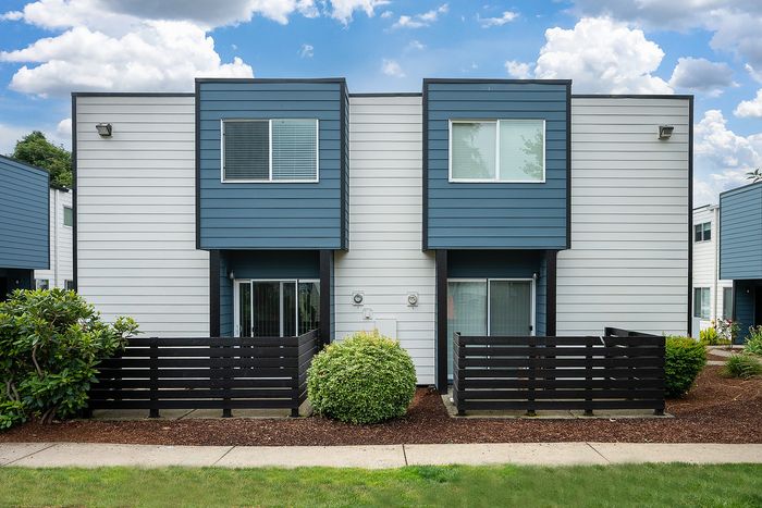 Exterior of Boulder Gardens showing apartment patios