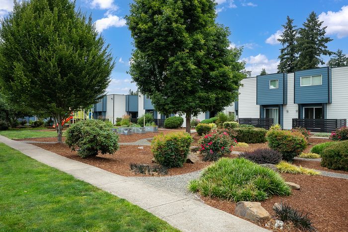 Courtyard at Boulder Gardens with landscaping and walking path