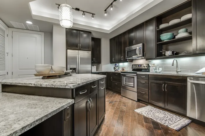 Residents Cooking in the Kitchen | The James | HOUSTON, TEXAS