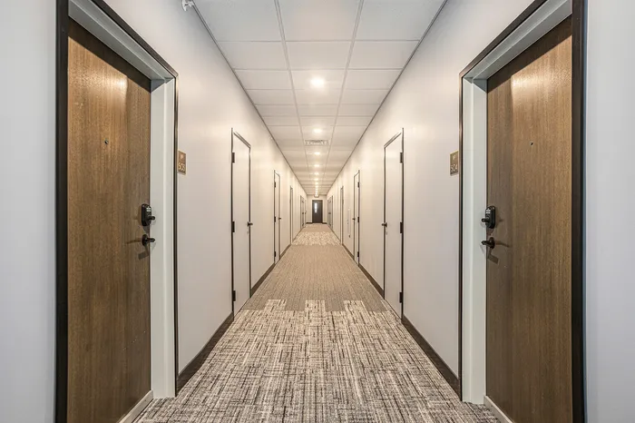 The Tribune Lofts - Hallway with Keyless entry