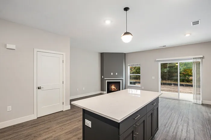 The Summit at Harvey Townhomes - Kitchen & Living Room