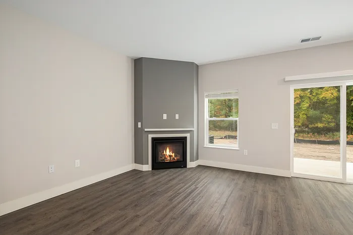 The Summit at Harvey Townhomes - Living Room Fireplace