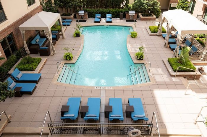 Heated Pool with Cabanas and BBQ Grills Apartments in Houston, TX | The Belle Meade at River Oaks