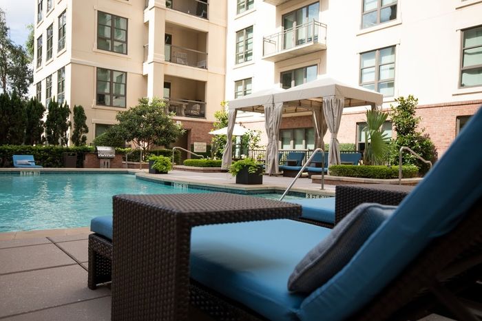 Chaise Lounge on Pool Deck Apartments in Houston, TX | The Belle Meade at River Oaks