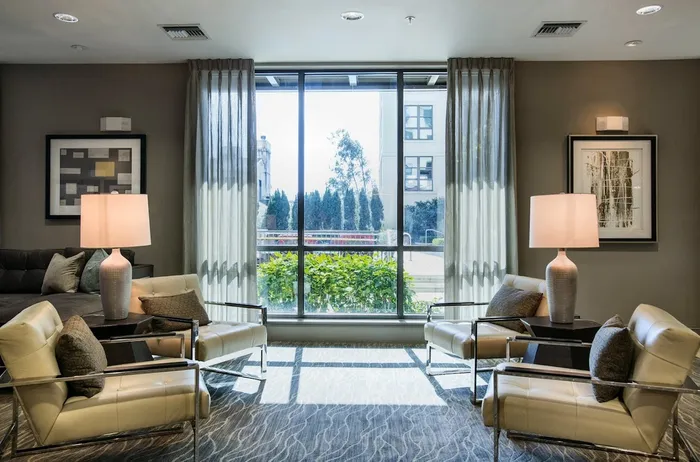 Resident Lounge Overlooking Pool | Houston TX Apartments For Rent | The Belle Meade at River Oaks