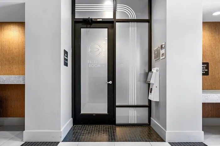 Sleek package room entrance with modern design and secure access, perfect for convenient parcel deliveries.