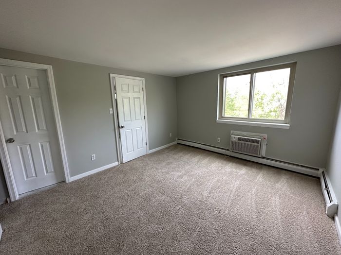 carpeted bedroom