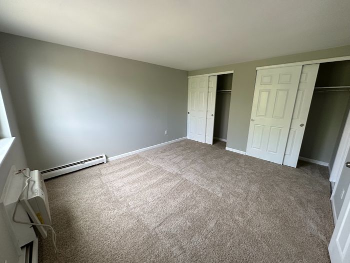 carpeted bedroom