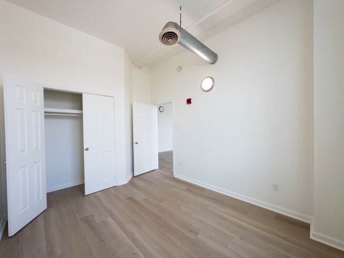 bedroom with double door closet