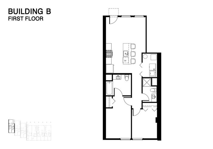 Inviting first floor plan for Building B featuring a sleek design with two bedrooms, modern kitchen, cozy living area, and two spacious bathrooms.