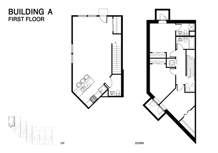 Elegant first-floor layout of Building A showcasing a unique two-level design with a stylish open kitchen, dining area, and dual bathrooms.