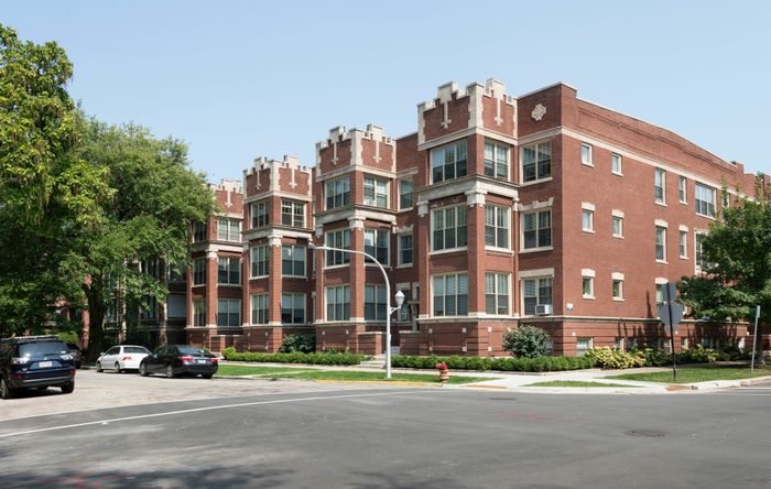 Exterior of 5135-45 South Ingleside a handsome twenty two unit three story vintage red brick building on a corner lot in Hyde Park.