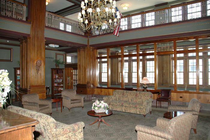 Free and ample community space with couches and stuffed chairs.