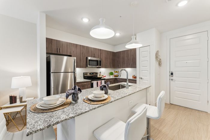 Make every meal a delight in our beautifully designed, modern kitchens at Latitude Apartments.