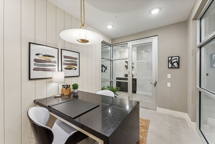 A cozy office space with modern lighting at comfortable seats