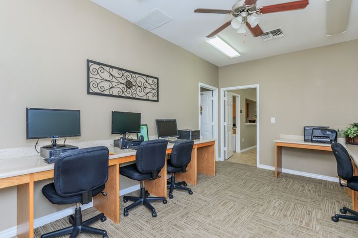Business center exterior at Southwest Pines in Tyler, TX, offering modern office spaces for rent.