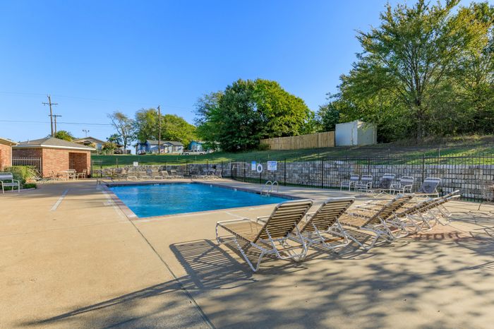 Beautiful sparkling swimming pool at Southwest Pines in Tyler, TX