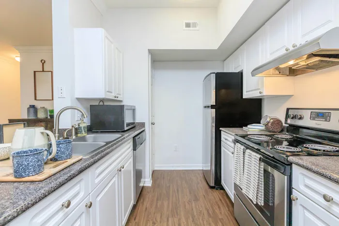 a beautiful modern kitchen with modern appliances