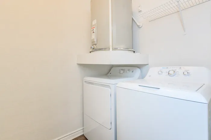 in-home washer and dryer with wire shelving for ultimate convenience