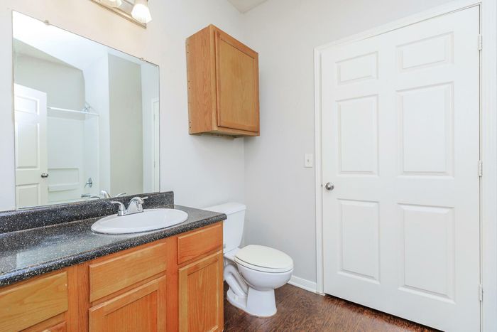 Stylish and modern bathroom featuring premium fixtures at Southwest Pines in Tyler, TX
