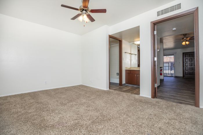 Spacious bedroom with natural light at Las Brisas Apartments in Albuquerque, NM