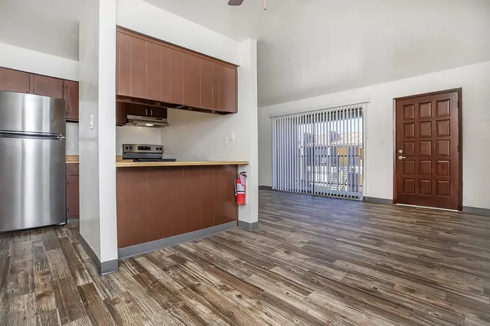 Elegant dining room with an open layout at Las Brisas Apartments in Albuquerque, NM.