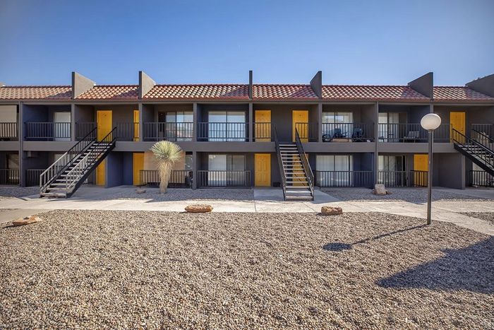 Exterior view of Las Brisas Apartments buildings in Albuquerque, NM