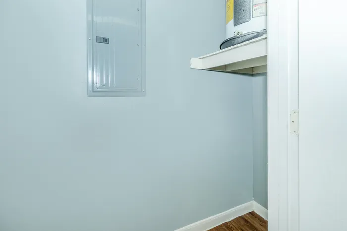 Washer and dryer connections in a modern laundry space at Portside Villas, Ingleside, TX.