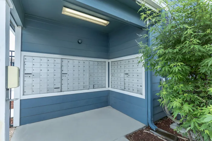 Secure and organized mail room with lockers and a clean design at Portside Villas, Ingleside, TX.