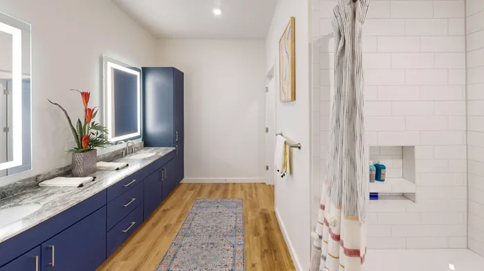 spacious double sink bathrooms with blue counters
