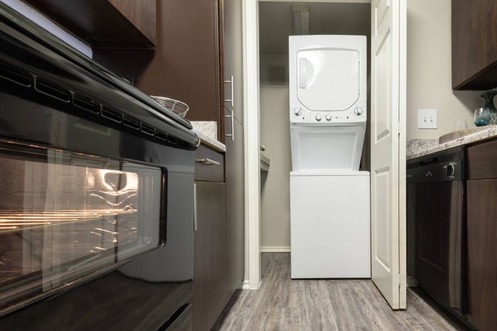 washer and dryer attached to kitchen