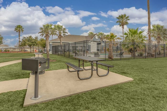 Relaxing picnic area with BBQ grills at Sierra Royale, Robstown, TX