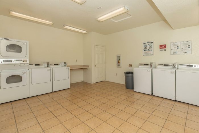 On-site laundry facility with modern appliances and spacious layout at Santa Teresa Terrace in Santa Teresa, NM.