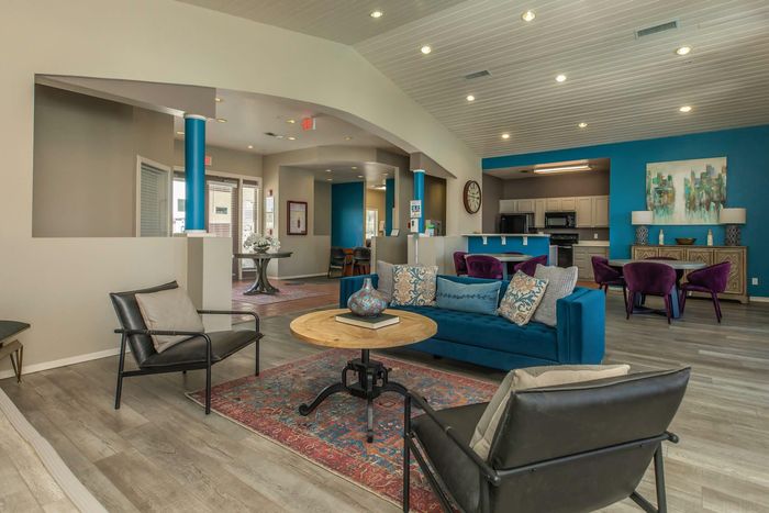 Spacious clubhouse with elegant seating areas and modern furnishings at Santa Teresa Terrace in Santa Teresa, NM.