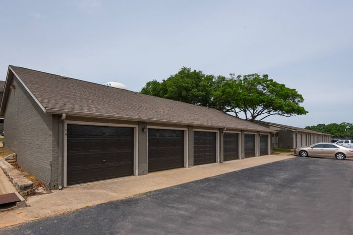 Private garages at Oak Park Apartments in Euless, TX, offering additional storage and parking options.