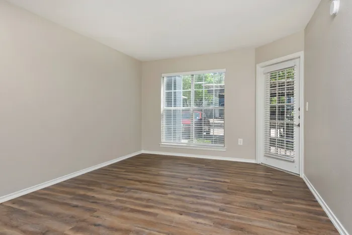 large living room with big windows and a lot of natural lighting