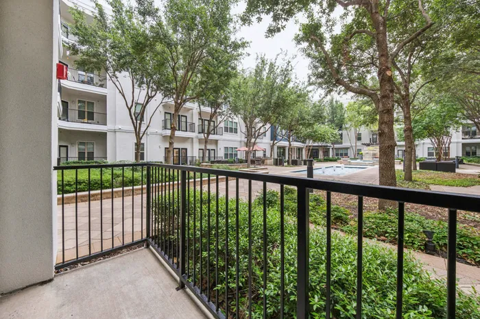 Modern balcony with scenic views at Addison Keller Springs in Addison, TX