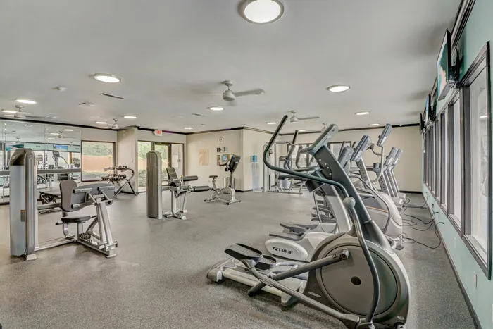 Spacious fitness center with state-of-the-art equipment at Oak Park Apartments in Euless, TX.