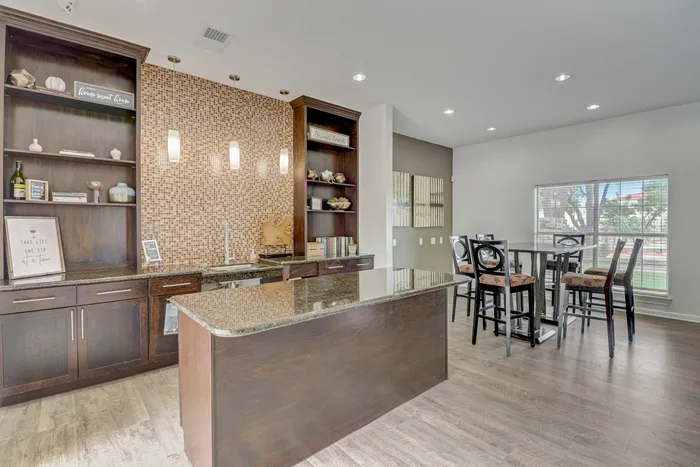 Chic and inviting cafe-style lounge at Oak Park Apartments in Euless, TX.