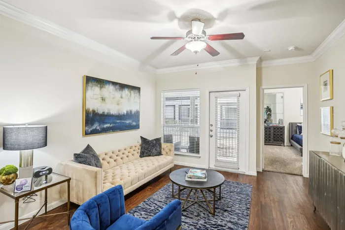 spacious living with ceiling fan