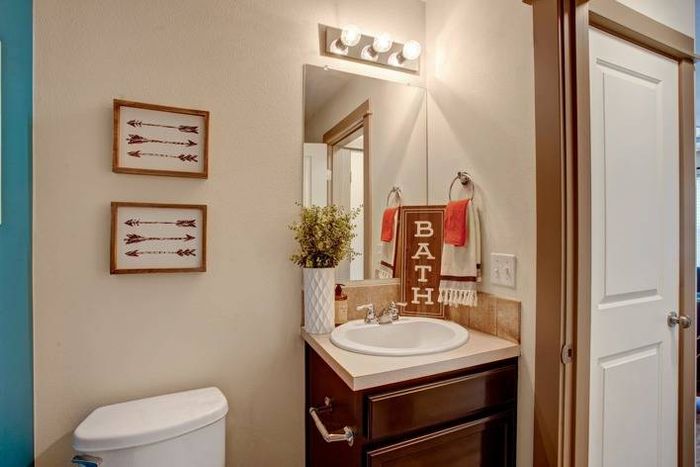 Vibrant bathroom with colorful accents and modern fixtures at Navigator Villas in Pasco, WA.